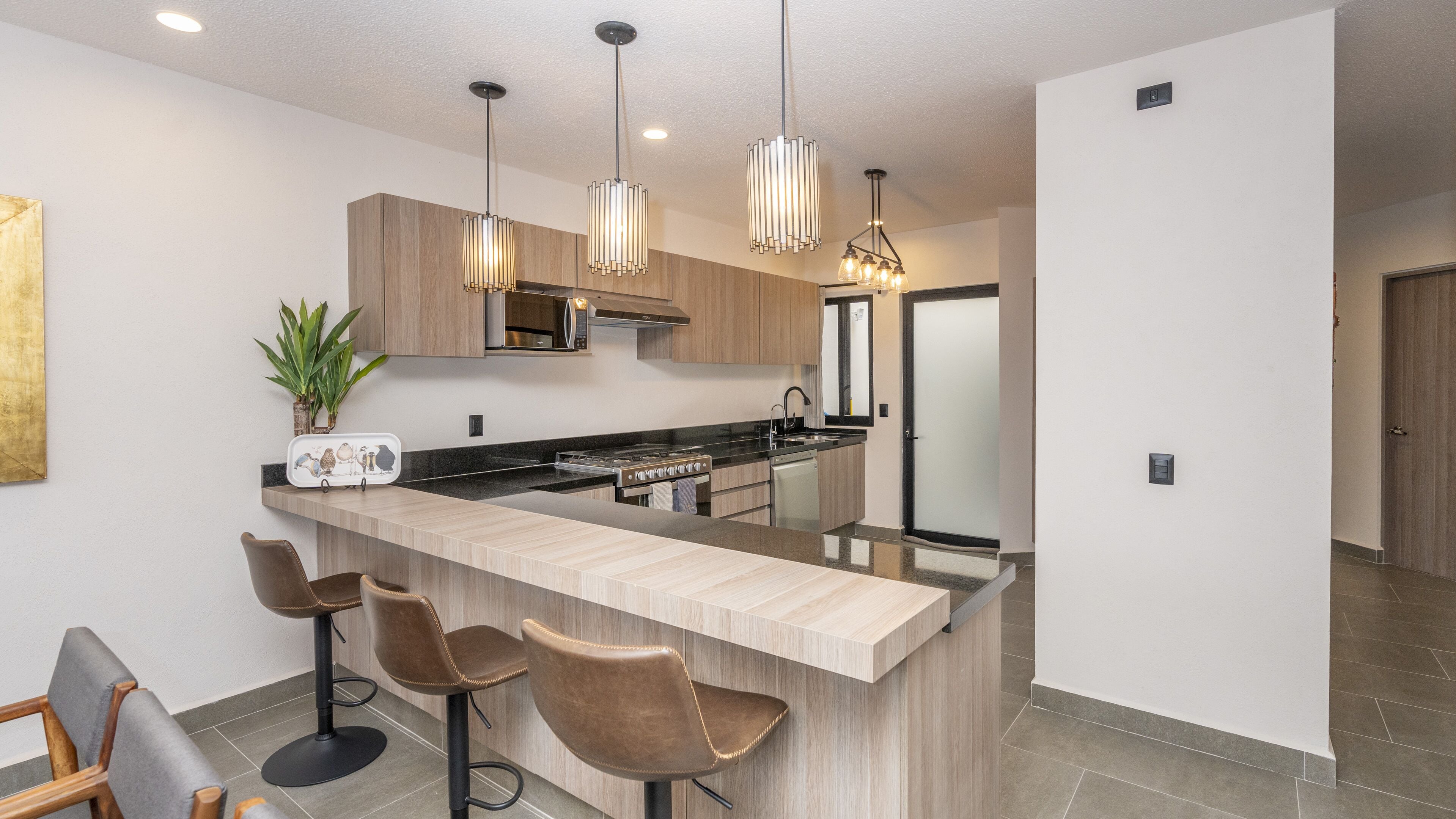 Deluxe House | Private kitchen | Full-sized fridge, microwave, oven, dishwasher