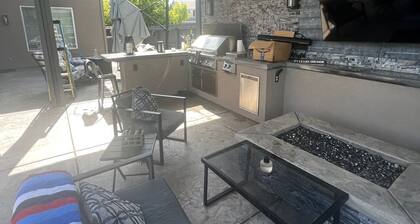 This stunning luxury home is located 10 minutes from the airport and downtown!