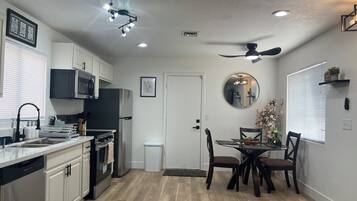 Coffee/tea maker, fridge, microwave, oven