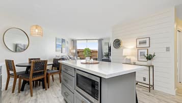 Luxury Condo | Private kitchen | Full-sized fridge, microwave, oven, dishwasher