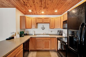 Exclusive Villa | Private kitchen | Full-size fridge, microwave, oven, stovetop