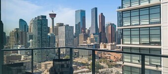 Walk to Saddledome | AC | DT Views | UG Parking