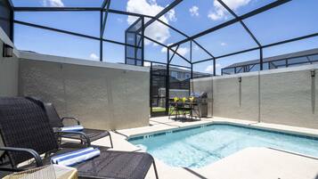 Outdoor pool, sun loungers, lifeguards on site