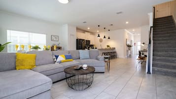 Exclusive House | Living room | 60-inch Smart TV with cable channels, Netflix, Hulu