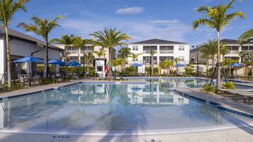 Outdoor pool, sun loungers, lifeguards on site