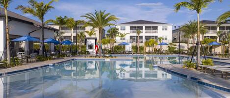 Outdoor pool, sun loungers, lifeguards on site
