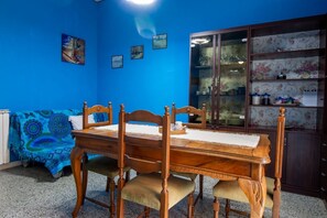 Dining - GuestHost - Apartment located on the second floor of a three-story building with no elevator.In 60 square meters of space it comfortably accommodates 6 people, with one double bedroom, one with two single beds and a sofa bed in the living room.The proper (Ferrara)
