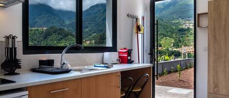 Fridge, coffee/tea maker, toaster, cookware/dishes/utensils