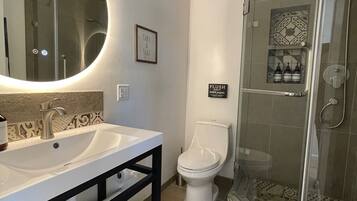 Shower, hair dryer, towels, soap