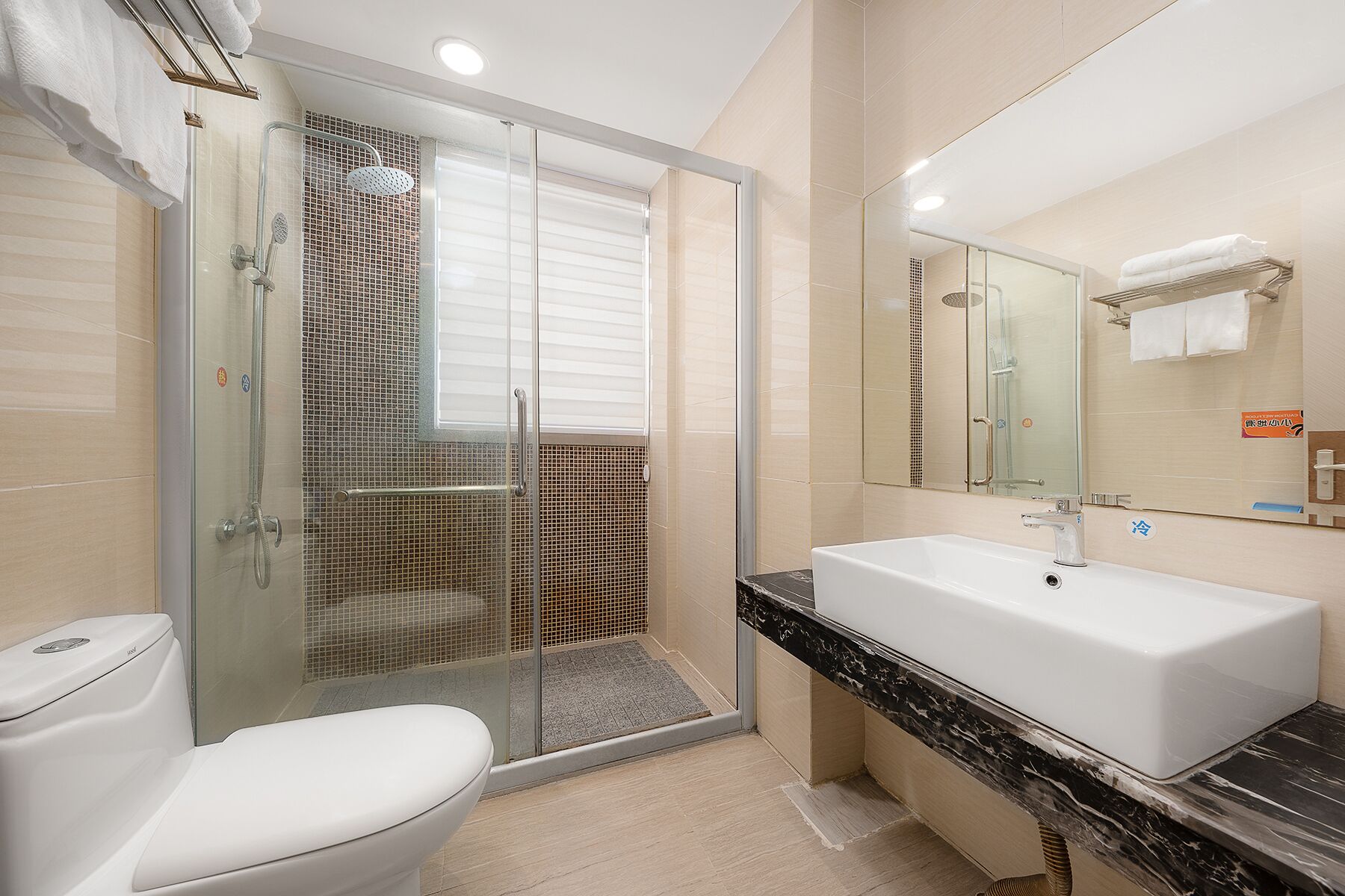 shower, rainfall showerhead, designer toiletries, hair dryer