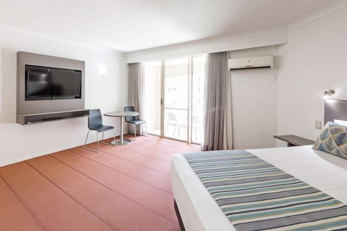 Desk, blackout curtains, iron/ironing board, bed sheets