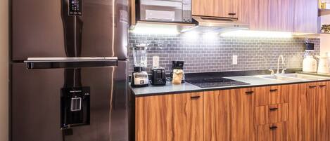 Fridge, microwave, stovetop, coffee/tea maker