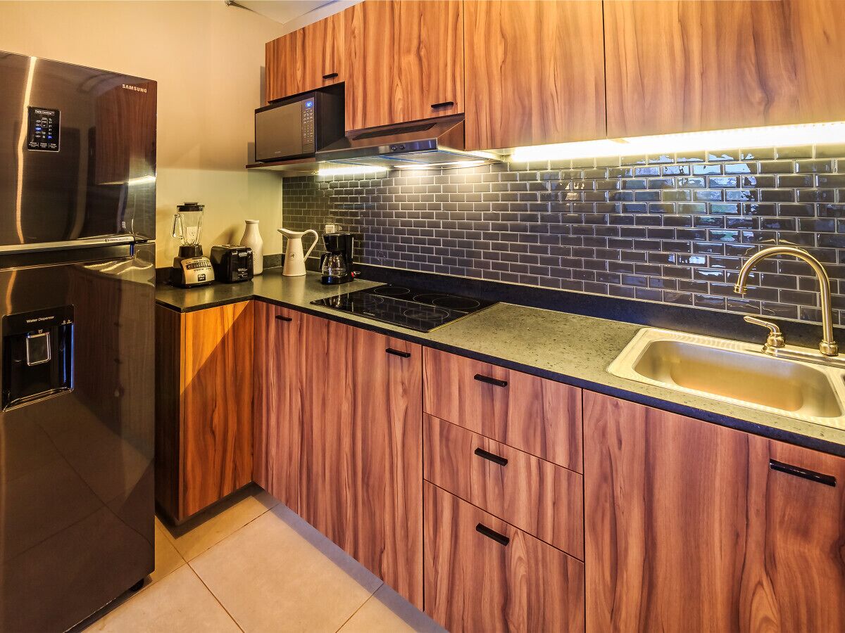 Fridge, microwave, stovetop, coffee/tea maker