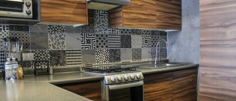 Oven, stovetop, coffee/tea maker, cookware/dishes/utensils