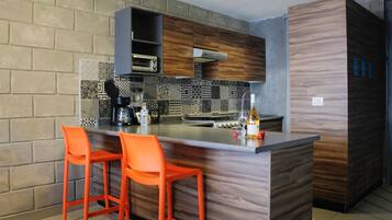 Oven, stovetop, coffee/tea maker, cookware/dishes/utensils