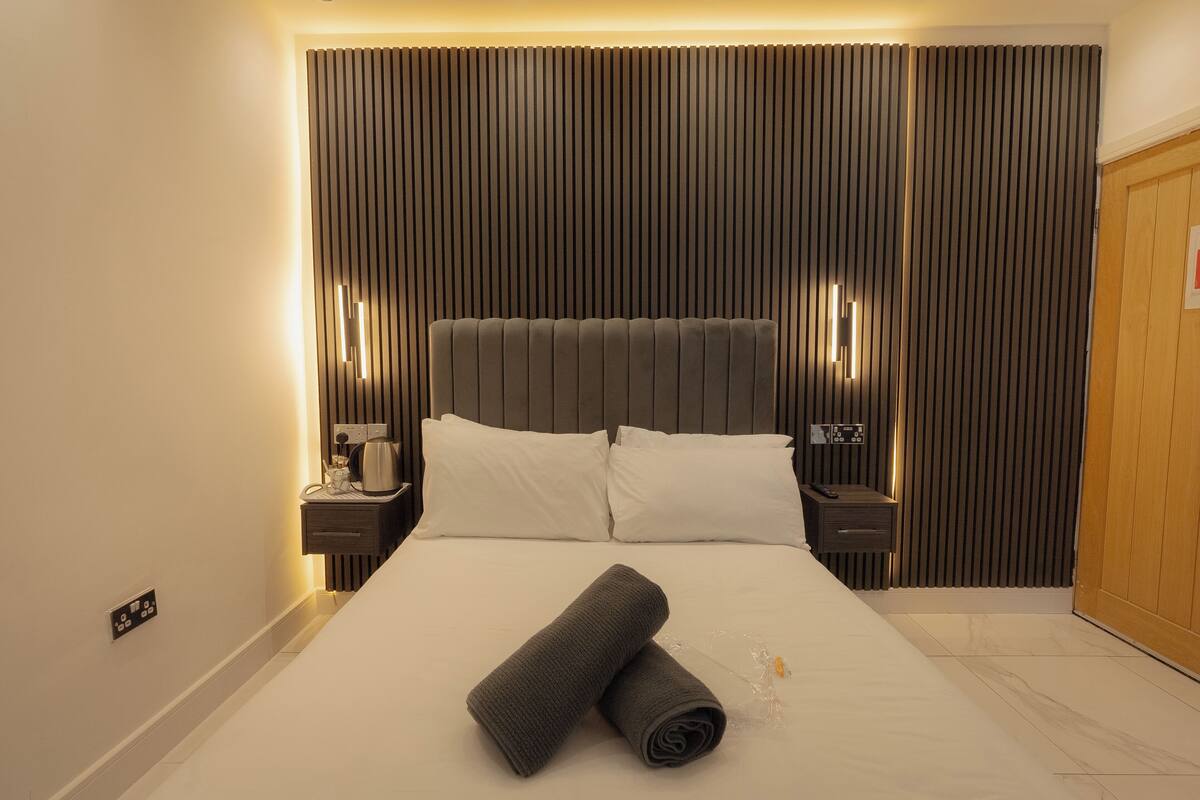 Memory-foam beds, desk, iron/ironing board, bed sheets