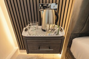 Memory-foam beds, desk, iron/ironing board, bed sheets