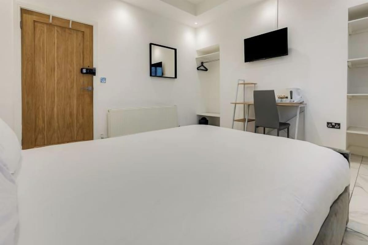 Memory foam beds, desk, iron/ironing board, bed sheets