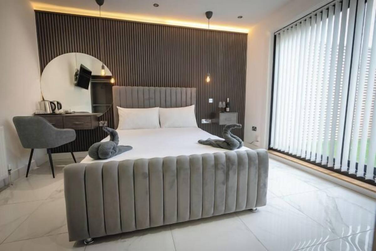 Memory-foam beds, desk, iron/ironing board, bed sheets