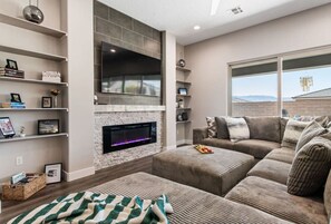 Smart TV, fireplace, books