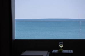 Enjoy a serene view of the calm body of water from the comfort of your room.