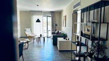 Apartamento, 2 quartos, sacada, vista para o oceano | Área de estar
