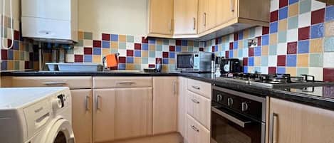 Apartment | Private kitchen | Fridge, microwave, oven, stovetop
