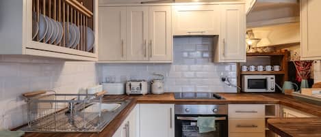 Fridge, electric kettle, toaster, cookware/dishes/utensils