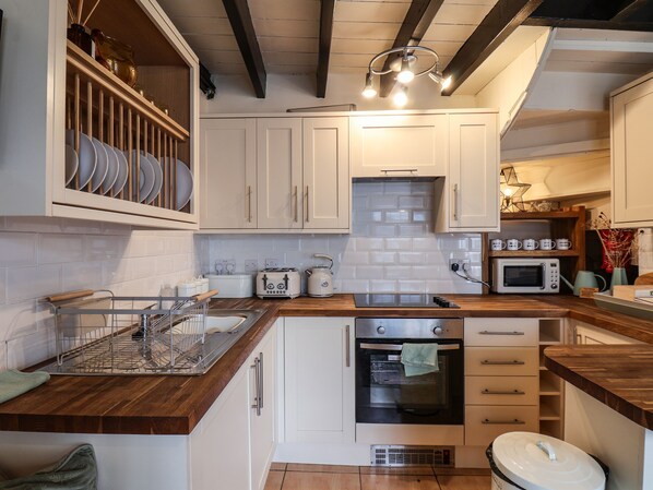 Fridge, electric kettle, toaster, cookware/dishes/utensils