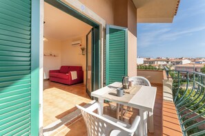 Apartment, 1 Bedroom, Balcony | Outdoor dining - Quaint Residence I Mirti Bianchi 1 Bedroom Apartments Sleeps 2 Persons (Santa Teresa di Gallura)
