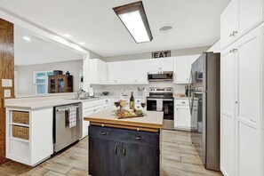 House, Multiple Beds, Hot Tub (1203 Crenwelge Dr) | Private kitchen | Fridge, microwave, oven, stovetop