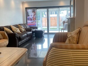 House, Multiple Beds | Living area