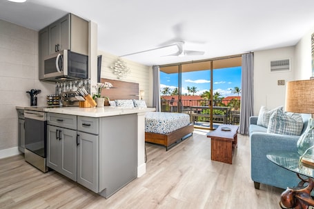 Luxury Condo | Private kitchen | Full-size fridge, microwave, oven, stovetop