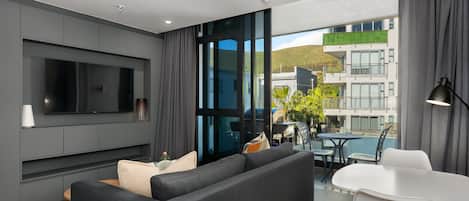 City appartement | Woonruimte | Een flatscreentelevisie, Netflix en streamingdiensten