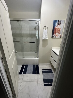 Hair dryer, towels, soap, shampoo