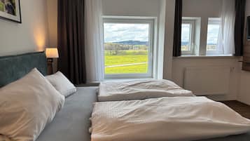Desk, laptop workspace, free WiFi, bed sheets