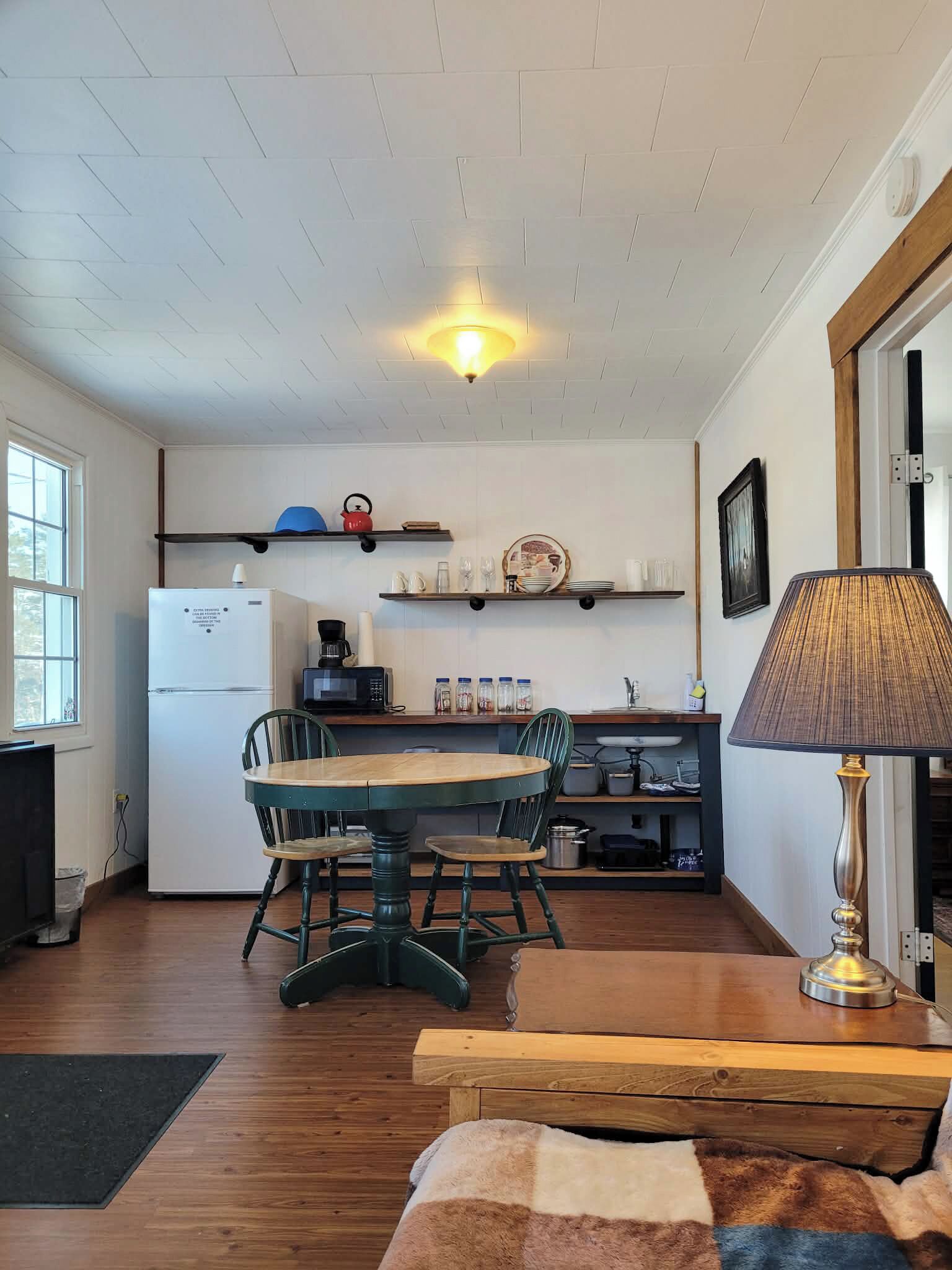 Cabaña de diseñador | Área de sala de estar