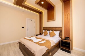 Premium bedding, desk, blackout curtains, soundproofing