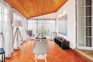 Superior Room | Living area | 40-inch flat-screen TV with digital channels