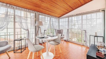 Superior Room | Living area | 40-inch flat-screen TV with digital channels