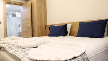 Standard Double Room | Minibar, in-room safe, desk, laptop workspace