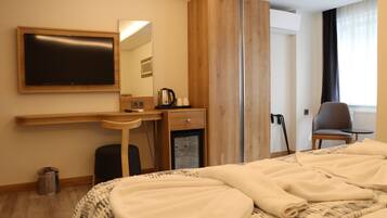 Minibar, in-room safe, desk, laptop workspace