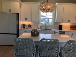 Fridge, microwave, oven, dishwasher - Discover the Sun-Kissed Mermaid: a cozy 2-bedroom retreat just steps from Holden Beach! (Holden Beach)
