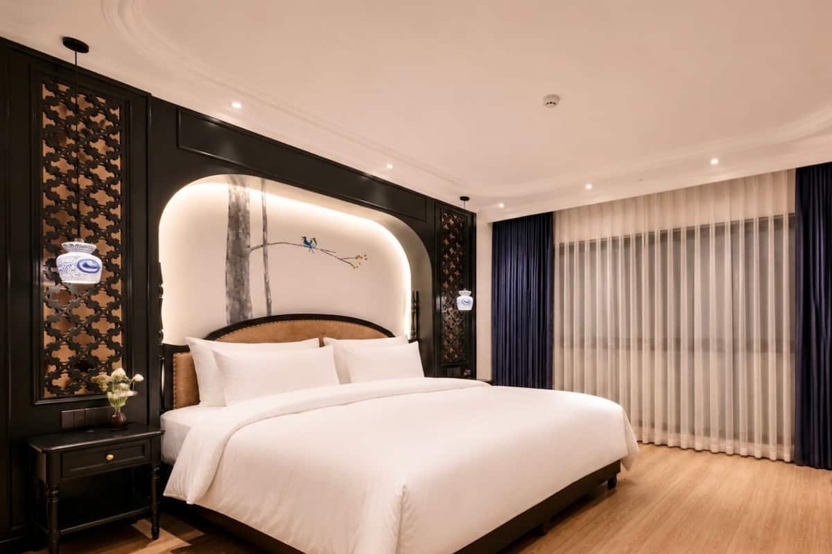 Deluxe Family Suite | Minibar, brankas, meja kerja, dan ruang kerja ramah laptop