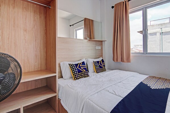 Economy Double Room | Desk, laptop workspace, free WiFi, bed sheets - Hotel O Anugrah Jaya Syariah Near Sekolah Dasar Negeri 018 Desa Kubang Jaya (Pekanbaru)