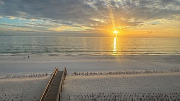 On the beach, sun-loungers, beach towels