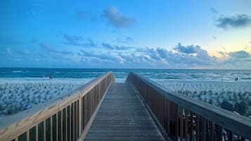 On the beach, sun loungers, beach towels