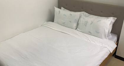Coupleâs Room- New Apartment in Palompon