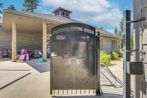 A metal gate with a sign reading 'POUDER HOUSE PASS' and 'No Glass in Pool Areas.' - Modern Lead A-frame w/ Hot Tub: Hike, Bike & Atv! (Lead)