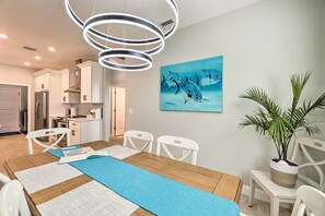 A modern kitchen with white cabinets, a built-in oven, and a stainless steel refrigerator. - 5 Mi to Beach & Walk to Park: Modern Venice Home (Venice)